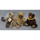 A toy cat and three Artist bears Cat 30cm high