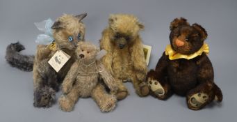 A toy cat and three Artist bears Cat 30cm high