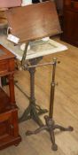 A Victorian Norths patent cast iron and brass reading table H.120cm