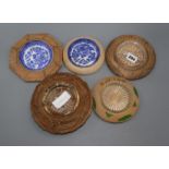 Five carved wood butter dishes