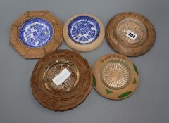 Five carved wood butter dishes