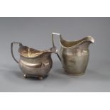 Two George III silver cream jugs, London, 1801 and 1808, 8 oz.