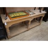 A pine two tier serving table L.193cm