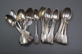 A set of six William IV silver fiddle pattern teaspoons and sixteen similar spoons 15 oz.