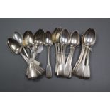 A set of six William IV silver fiddle pattern teaspoons and sixteen similar spoons 15 oz.