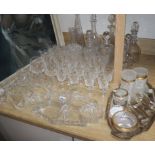 A part suite of cut table glassware with bucket-shaped bowls, an hors d'oeuvres set on plated tray