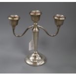 A modern silver two branch, three light candelabrum, 22.6cm.