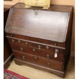 An 18th century oak bureau W.89cm