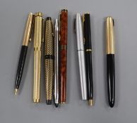 Eight assorted pens including Parker and Watermans.