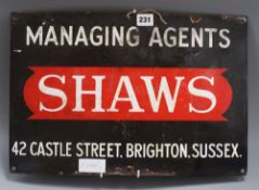 An enamel sign Shaws, Castle Street, Brighton 31 x 46cm