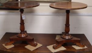 A pair of mahogany wine tables Diameter 42cm