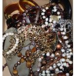 Mixed bangles and other costume jewellery.