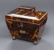 An early 19th century white metal mounted tortoiseshell sarcophagus tea caddy H.15cm, W.15cm