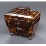 An early 19th century white metal mounted tortoiseshell sarcophagus tea caddy H.15cm, W.15cm