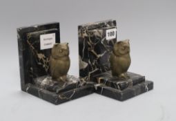 A pair of bronze and marble "owl" bookends height 14cm