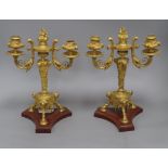 A pair of ormolu and rouge marble two branch candelabra height 32cm