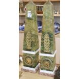 A pair of simulated felspar and marble obelisks height 70cm