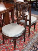 A pair of lyre back salon chairs