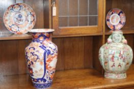 An Imari vase, two dishes and a modern famille rose vase