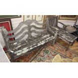 A weathered teak six piece garden furniture set Benches 150cm