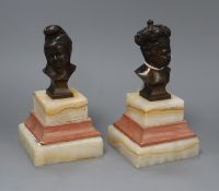 A pair of bronze busts of children on marble bases H.17cm