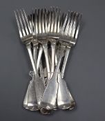 A set of eight William IV silver fiddle pattern table forks, London, 1835 and four similar forks, 30