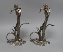 A pair of plated brass orchid candlesticks 28cm high