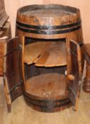 A staved wood barrel, converted into a bar H.91cm