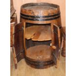 A staved wood barrel, converted into a bar H.91cm