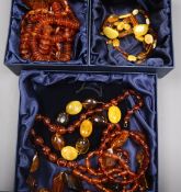 Mixed amber necklaces and bracelets.