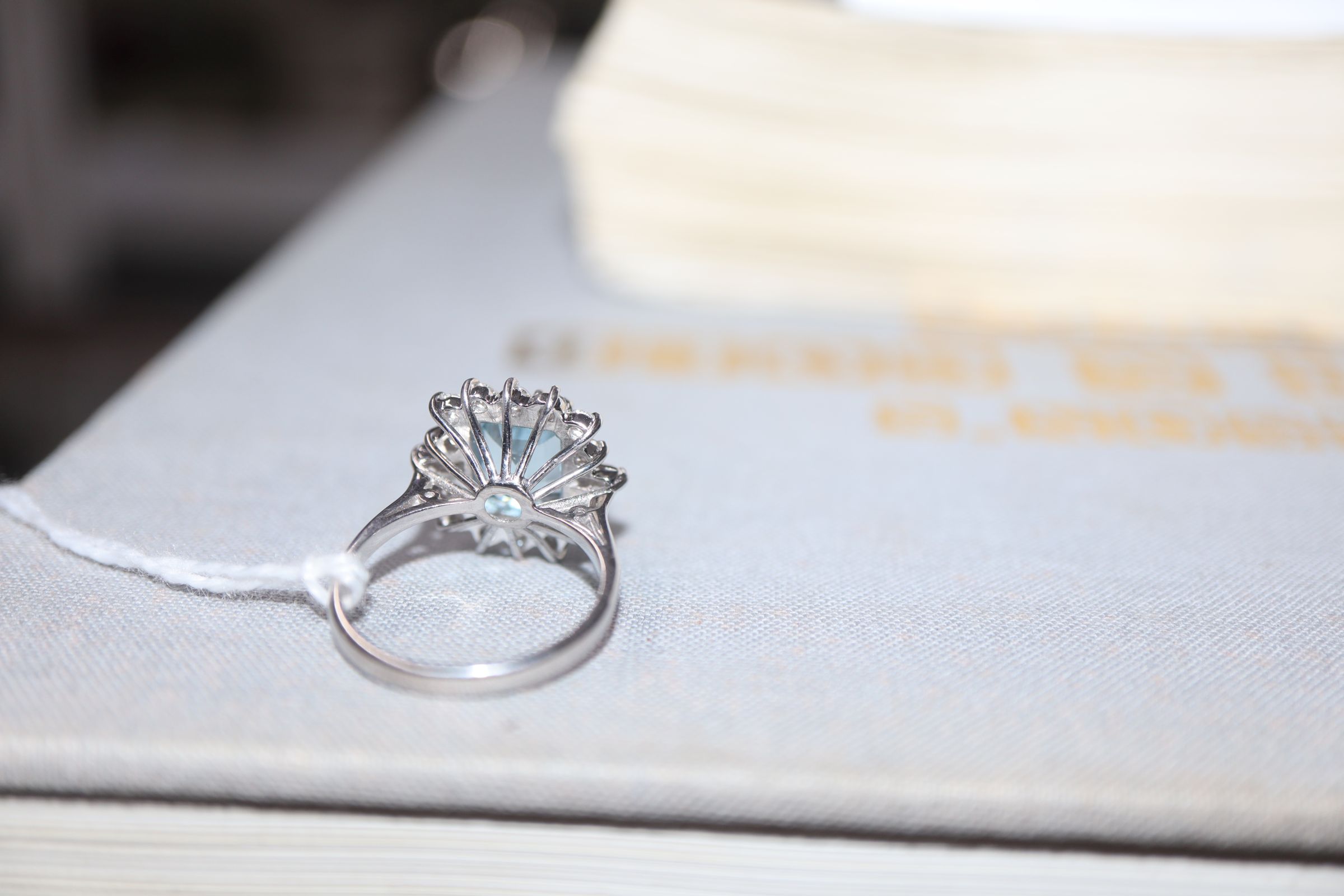 A modern 18ct white metal, aquamarine, baguette and round cut diamond set cluster ring, size K/L. - Image 3 of 6