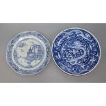 A Chinese blue and white dragon dish and a landscape plate largest 24.5cm