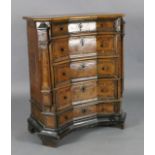 A late 17th century North Italian walnut chest five graduated long drawers with inverse breakfront