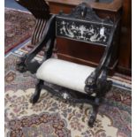 An Italian 19th century carved bone inlaid ebonised elbow chair