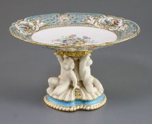 A Minton porcelain tazza, c.1860, with Sevres style flower and bird painted dish top above a gilt