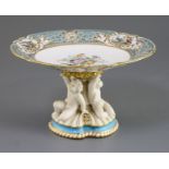 A Minton porcelain tazza, c.1860, with Sevres style flower and bird painted dish top above a gilt