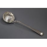 A Victorian silver beaded Old English pattern soup ladle by George Adams, London, 1869, 34cm, 8 oz.