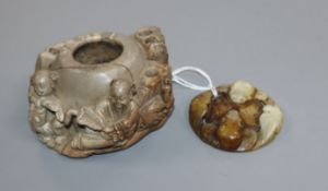 A soapstone brushwasher and russet jade carving