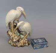 A Chinese Shiwan type group of cranes and a blue and white box and cover tallest 26cm