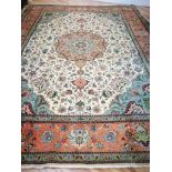 A Tabriz carpet 405 x 305cm