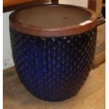 A blue glazed moulded body garden planter Diam.50cm