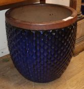 A blue glazed moulded body garden planter Diam.50cm