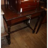 An early 20th century carved oak side table W.84cm