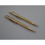 A 9ct gold cased pencil and a 585 cased pen.