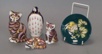 Three Royal Crown Derby paperweights - a cat, a penguin, a dog and a Moorcroft dish