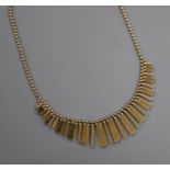 A 1980's Italian Uno-a-Erre 9ct gold fringe necklace, 46cm, 14 grams.