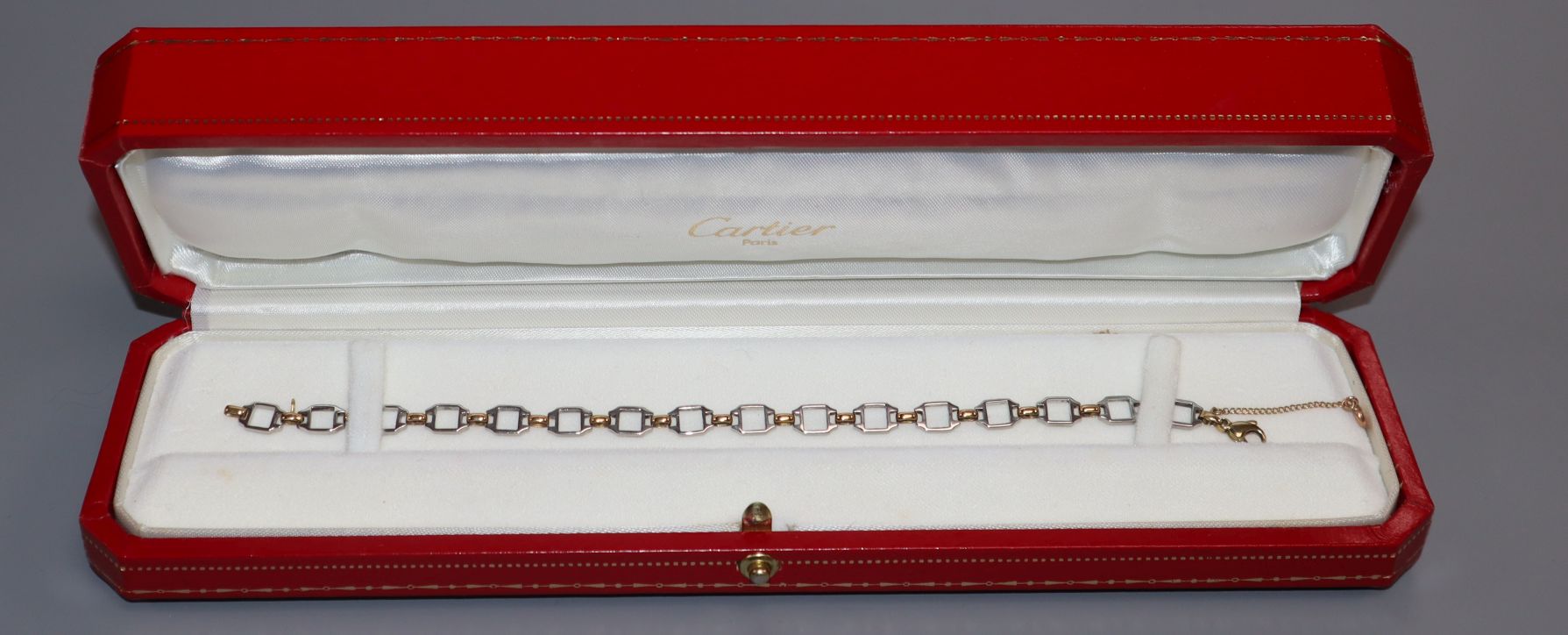 A Cartier steel and yellow metal bracelet with box and certificate, (later replaced 9ct clasp), - Image 2 of 2