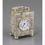 A late Victorian silver cased carriage timepiece, with textured basket weave decoration, maker, G.B,