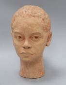 A sculptured terracotta head, signed Pat Shaw 1958, also signed Walter height 27cm