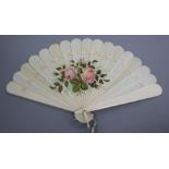 A late 19th century ivory fan painted with pink roses 23cm long